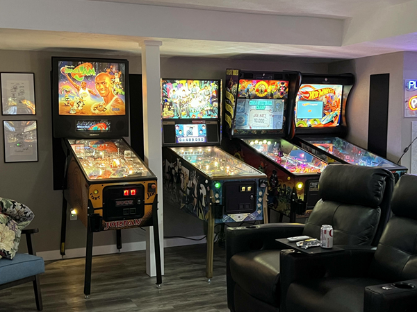A view of our other pinball wall showing Jersey Jack games, American Pinball, and some classics from the 1970s and the pool tabl, also our most expensive game on the floor, Beatlemania!