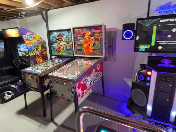 Our back room showing the dance games, arcade games, more pinballs, and slot machines.